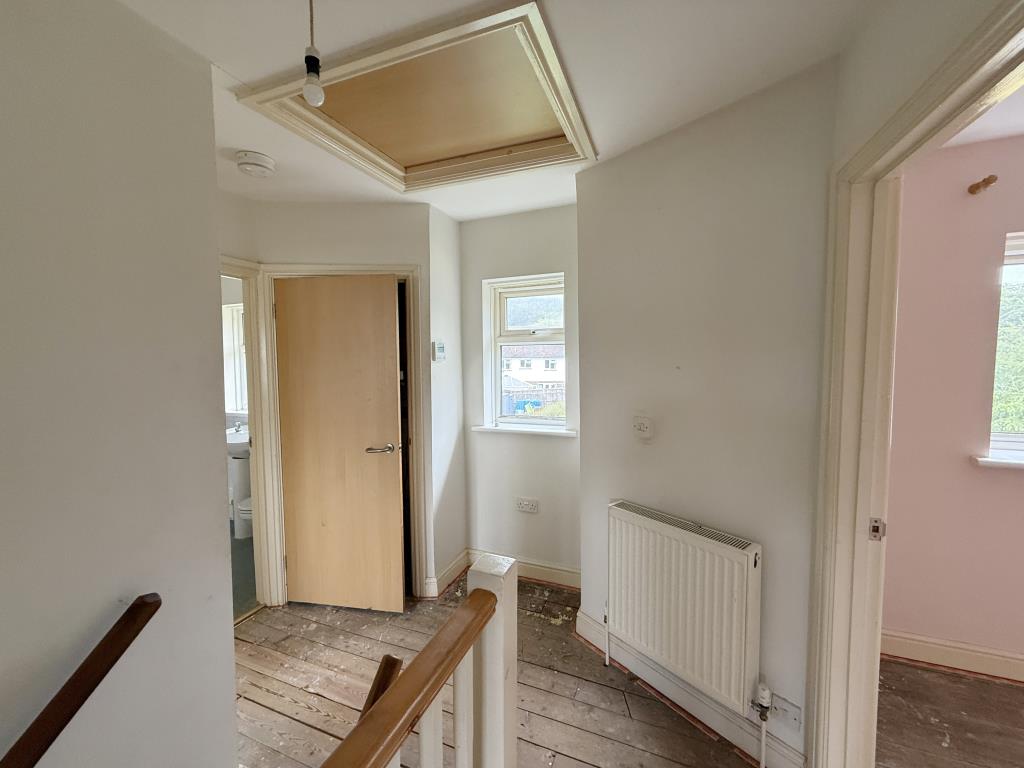 Lot: 135 - SEMI-DETACHED HOUSE IN NEED OF IMPROVEMENT IN VILLAGE SETTING - Landing of Village House in Need of Improvement